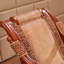 Chaise berçante en rotin naturel