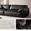 Causeuse-coussin modulable noire en cuir véritable-23077328