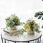 Arrangement de fleurs artificielles jaunes