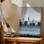 Toile «A Hazy City Skyline At Dawn» avec une silhouette d'art mural-1296058405