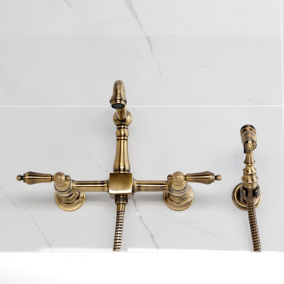 Kingston Brass Heritage Double-Handle 3-Hole Wall-Mount Bridge Kitchen Faucet with Brass Sprayer