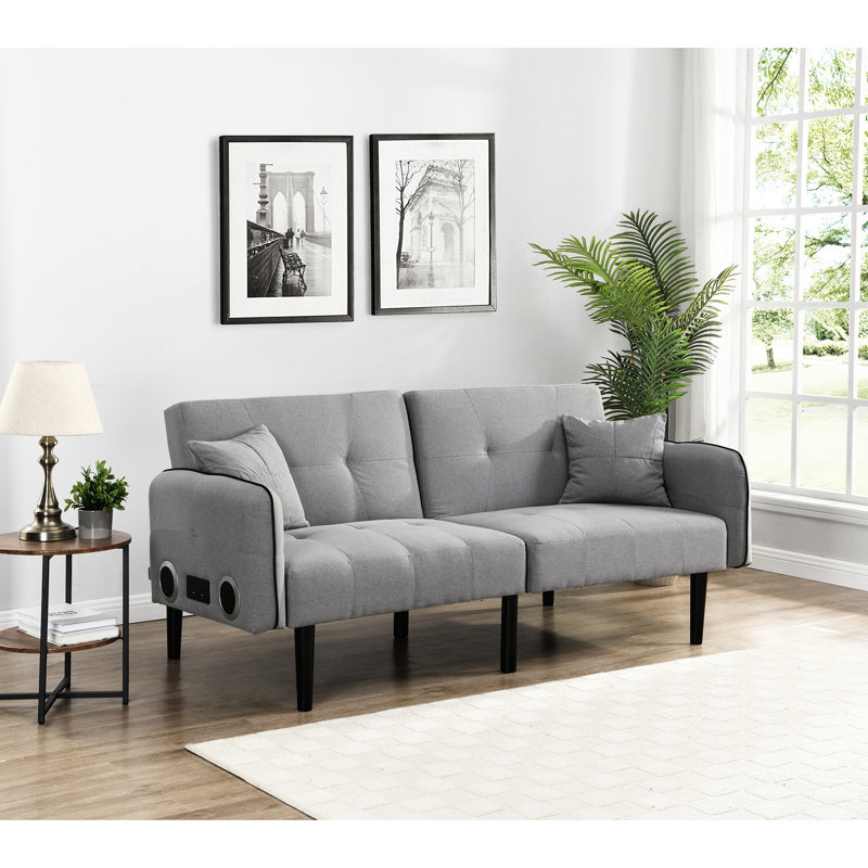 Lit pliant gris avec système stéréo. Multifonctionnel pour toute occasion. Lin loisirs et confort. Divertissement audio sans fil. Facile à ranger et à assembler rapidement. Polyvalent dans divers décors.