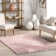 Risette Geometric Shag Tassel Area Rug