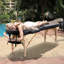 Table de massage portative ajustable avec appui-tête-734805864-710214889