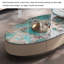 Table basse ovale en marbre clair de luxe-110567437