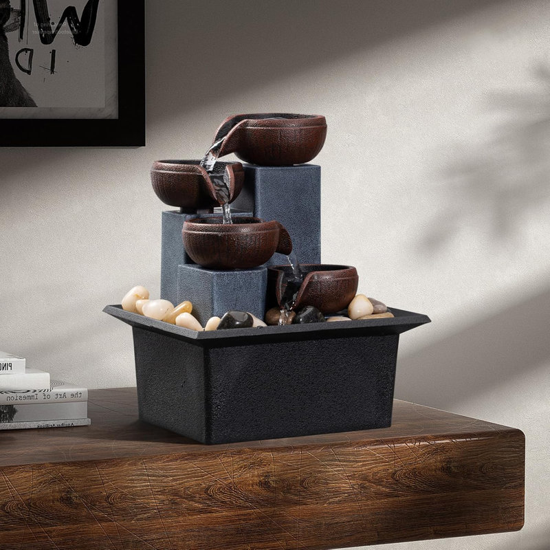 Tabletop fountain 4-tier cascade fountain includes LED colored lighting and natural rocks