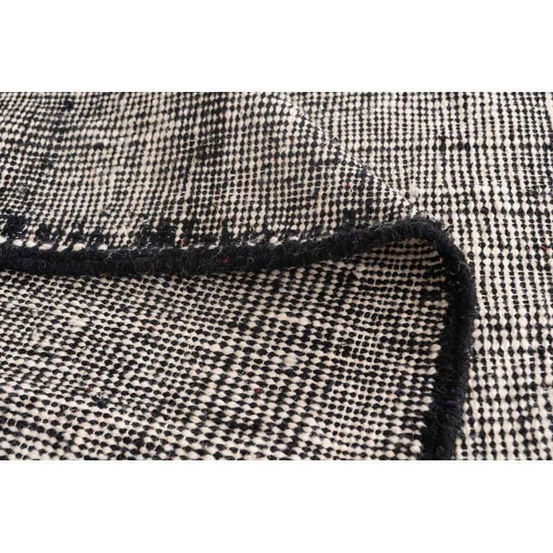 Tapis noir et blanc Orpheus