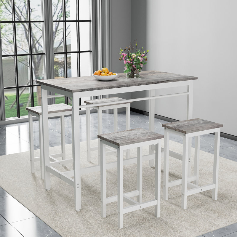 Ensemble de table de cuisine moderne cinq pièces avec quatre tabourets de bar, idéal pour les dîners de famille et les petites réunions, multifonctionnel pour divers espaces.