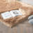 Blakes Solid Color Handmade Faux Sheepskin Area Rug in Beige-186776343