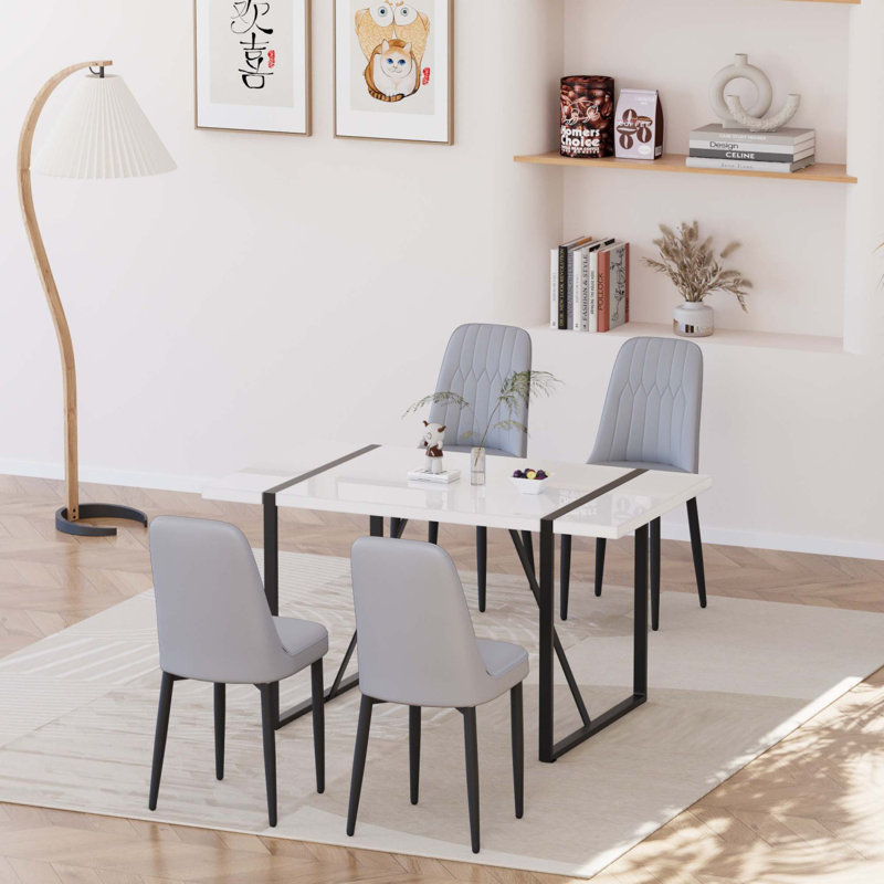 Ensemble de table de salle à manger moderne 55 po pour 4 personnes avec pieds en métal et chaises rembourrées en polyuréthane
