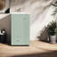 Meuble-lavabo vert compact avec armoire en MDF durable et lavabo moderne