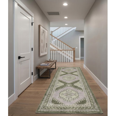 Tapis de couloir oriental vert clair en laine noué à la main
