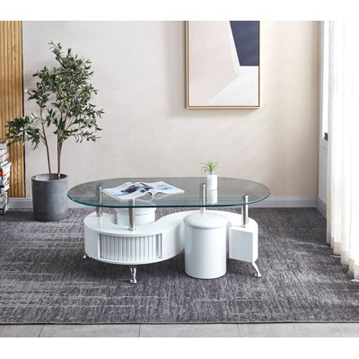 Patrizi Oval Glass Top Coffee Table by Ivy Bronx