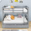 Lit superposé simple au-dessus d'un lit double en bois avec lit gigogne simple-631753947