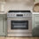 Cuisinière à gaz 36 po Tittla avec friture à l'air et nettoyage à la vapeur - 6 brûleurs, four à convection de 6 pi cu, acier inoxydable