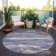 Aleighna Area Rug with Non-Slip Backing