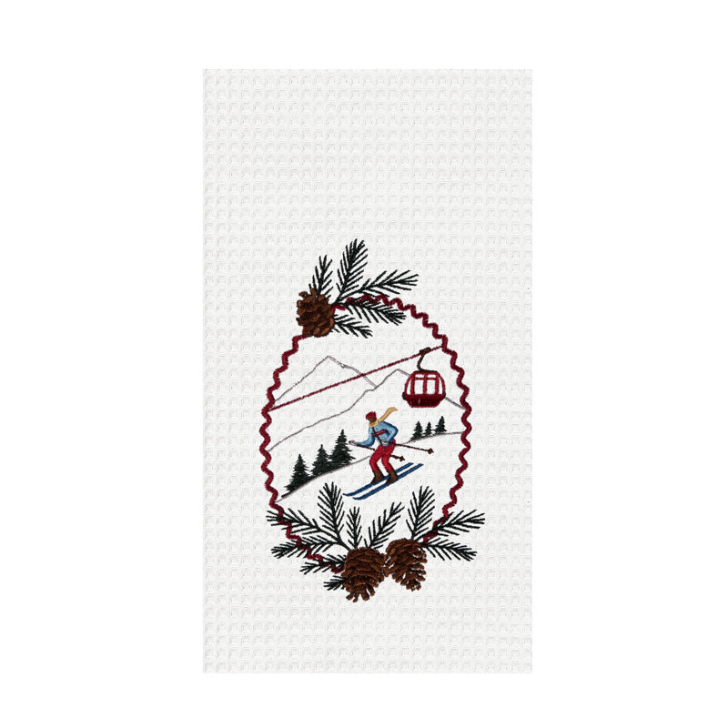 Piste de ski et sports d'hiver avec serviette de pommes de pin