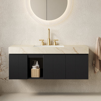 Meuble-lavabo suspendu EIDEN 76 cm (30 po), lavabo en céramique avec comptoir en pierre frittée veinée gris Carrara et trois trous prépercés pour robinetterie. Livré démonté, sans robinet ni bonde. Couleur : noir.