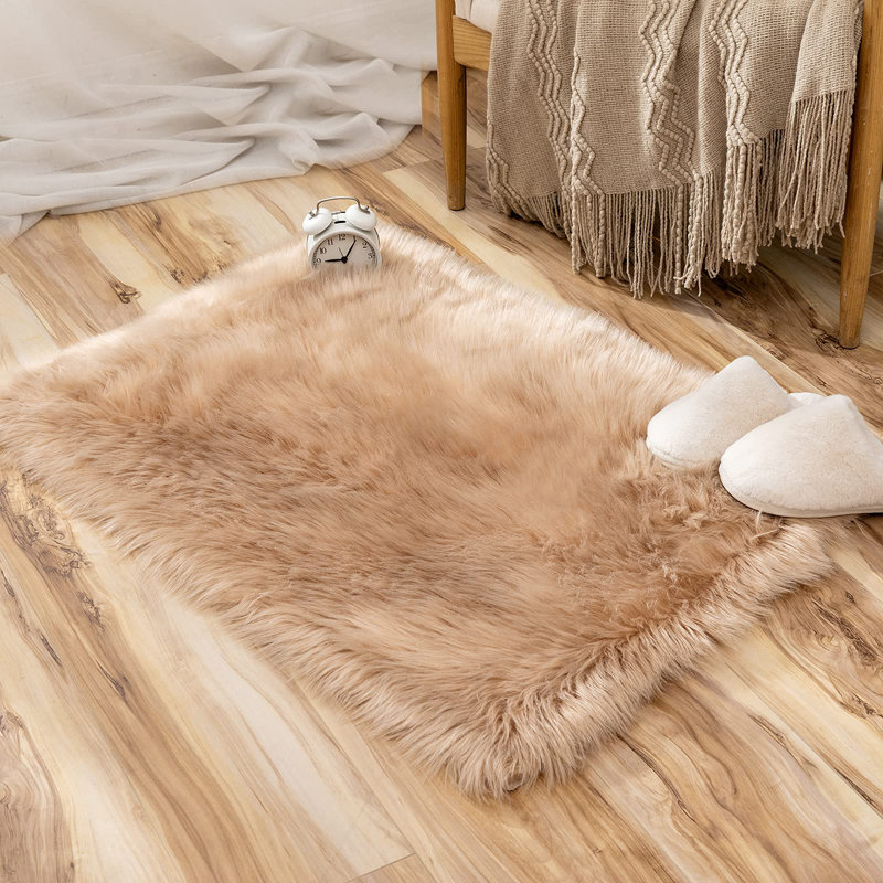 Blakes Solid Color Handmade Faux Sheepskin Area Rug in Beige, Rectangle 2' x 3'