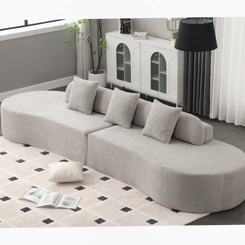 Canapé minimaliste incurvé avec tissu éponge pour le salon, confortable et élégant