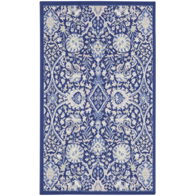 Tapis oriental bleu marine en polypropylène tissé à la machine