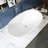 65 Inch Oval Freestanding Solid Surface Soaking Bathtub