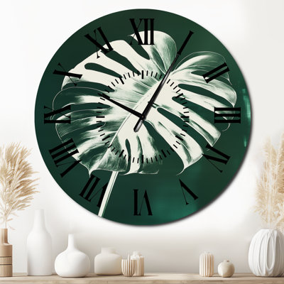 Horloge murale en métal Monstera