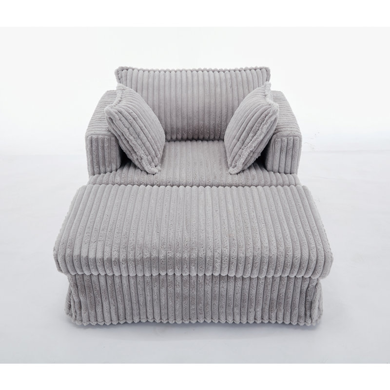 Fauteuil en velours côtelé avec repose-pieds