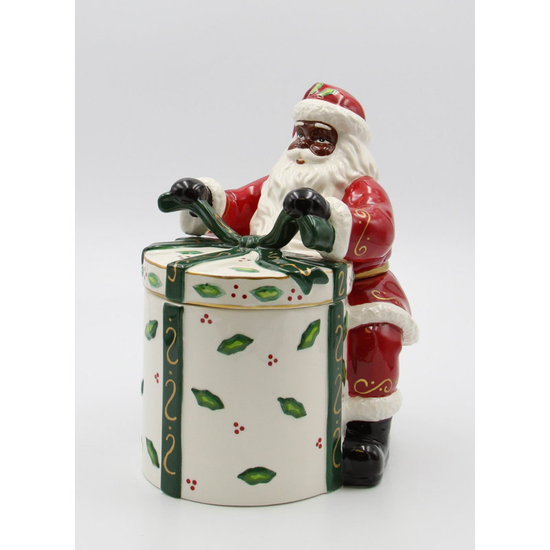 Père Noël africain avec pot à biscuits