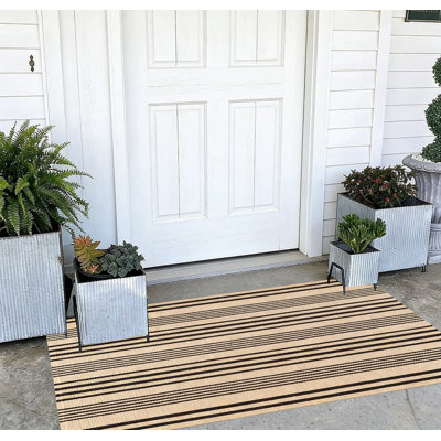 Tapis de porte de devant rayé lavable à la machine
