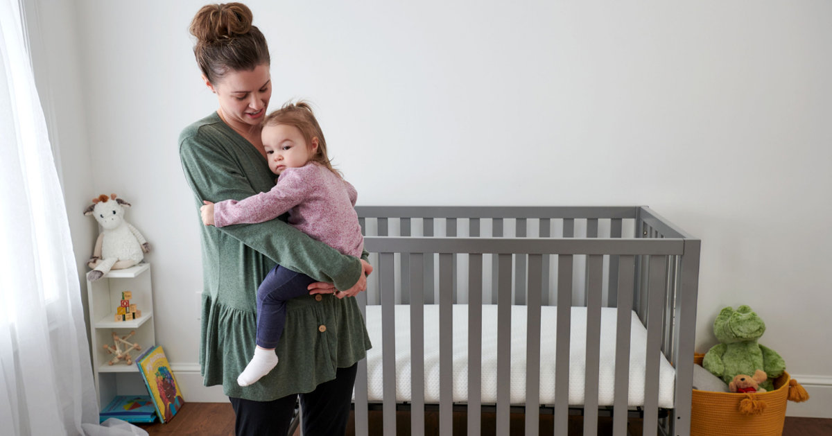 A mom and a baby in a nursery