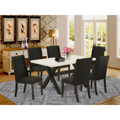 Ensemble de salle à manger 7 pièces composé d'une table de salle à manger rectangulaire avec pieds en X et 6 chaises Parson rembourrées en tissu noir, finition noire brossée