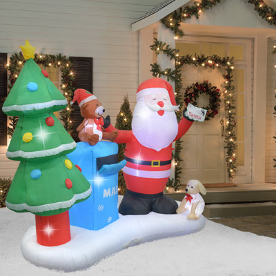 Père Noël avec boîte aux lettres gonflable