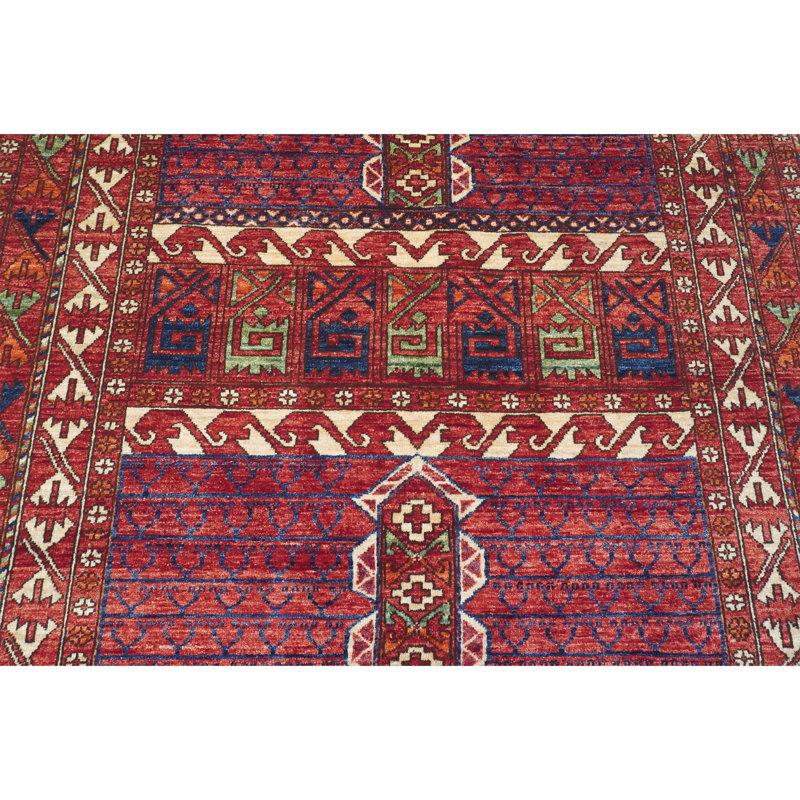 Tapis rouge et multicolore de haute qualité noué à la main