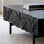 Table basse noire sculptée-110476767