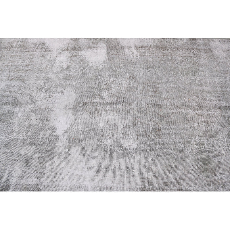 Tapis turc de style rétro dans des tons de terre profonds, idéal pour les espaces de vie intérieurs très fréquentés