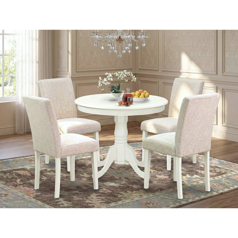 L'ensemble de table de salle à manger 5 pièces pour 4 personnes comprend une table de cuisine ronde avec piédestal et 4 chaises rembourrées en tissu de lin beige clair, lin blanc