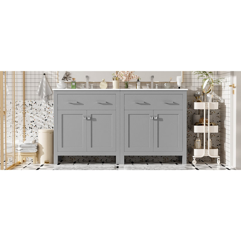 Ensemble de meuble-lavabo moderne gris avec deux lavabos en céramique, beaucoup de rangement et des portes à fermeture douce