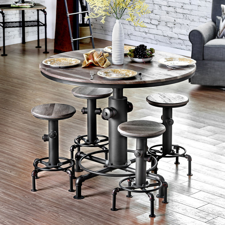 Poiret 4 - Person Pedestal Dining Set