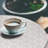Ebern Designs Geometric Fitted Round Tablecloth Pale Eggshell and White-1673573809