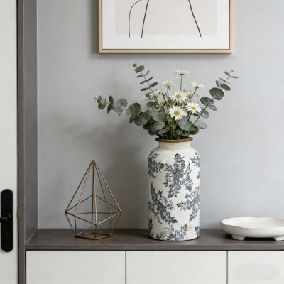 Vase en céramique blanche d'inspiration rétro avec motif floral