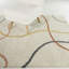 Tapis à poil long abstrait crème / orange / jaune Fliri-1753263698