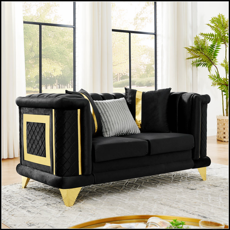 Canapé luxueux deux places en velours capitonné avec des accents métalliques et une texture brodée pour une décoration de salon élégante