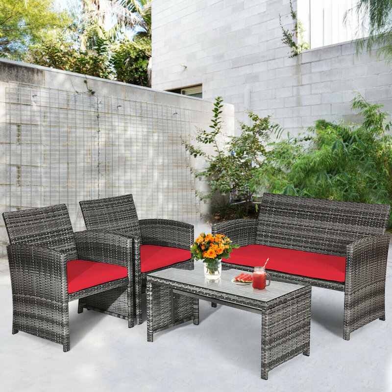 Ensemble de conversation 4 pièces avec plateau de table en verre et coussins Akshath, Rouge