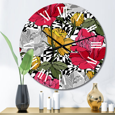 Horloge murale à motif fleurs rouges et jaunes sur fond noir et blanc