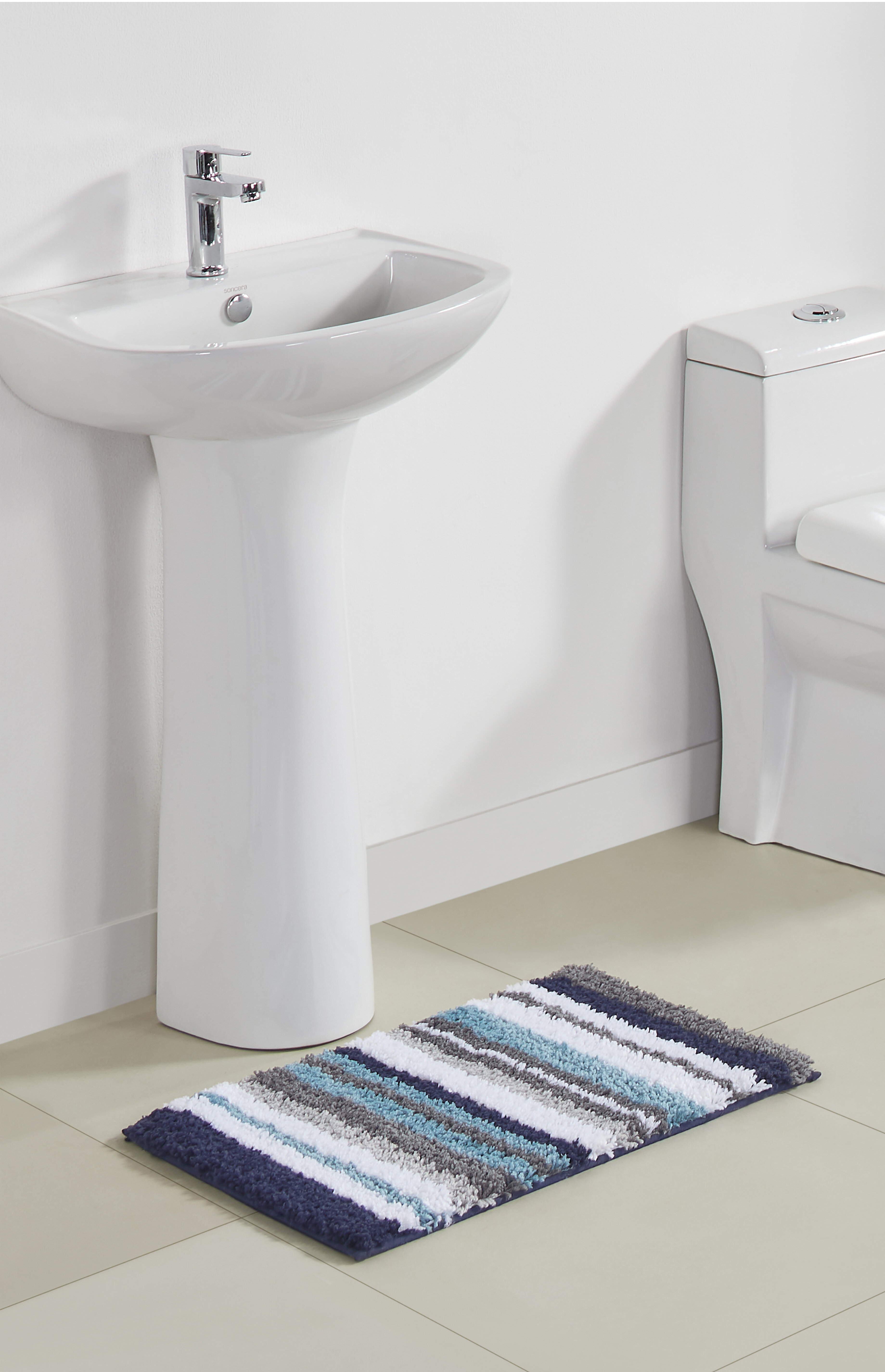 https://assets.wfcdn.com/im/85711027/compr-r85/1639/163996528/griffie-100-polyester-machine-washable-single-piece-bathroom-rug.jpg