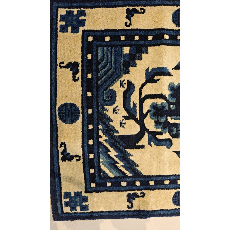 Tapis chinois antique blanc et bleu