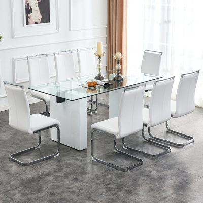 - ensemble de salle à manger en verre: plateau rectangulaire, base en bois aggloméré, chaises en similicuir à pieds argentés - style contemporain pour les grands espaces