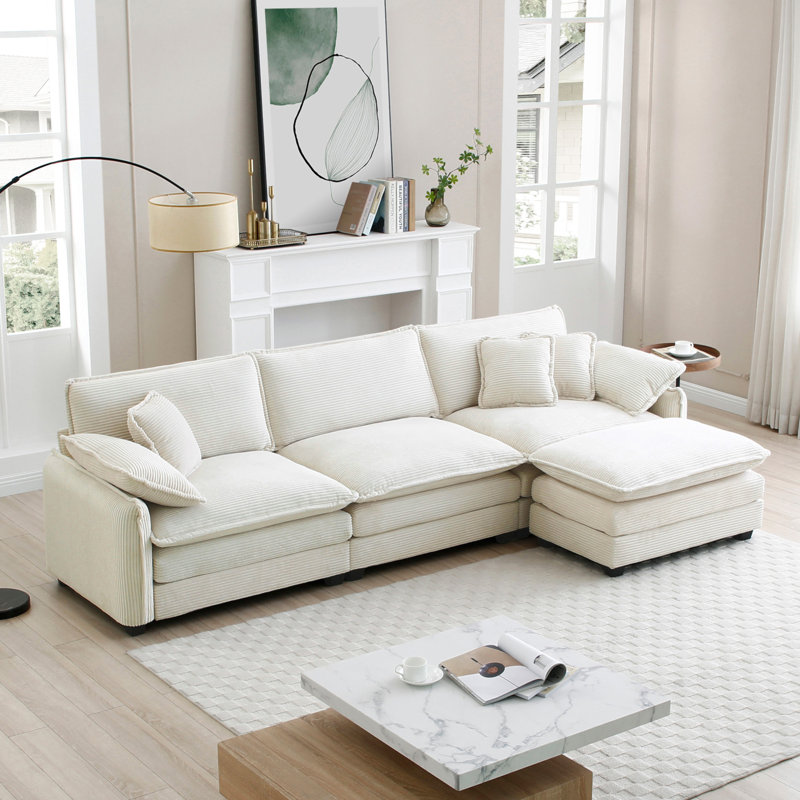 Luxueux canapé surdimensionné en forme de L avec repose-pieds pour le salon, alliant style et confort