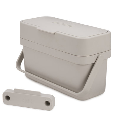Stone colored compost bin with a flip-up lid, handle, and a separate wall mounting bracket.